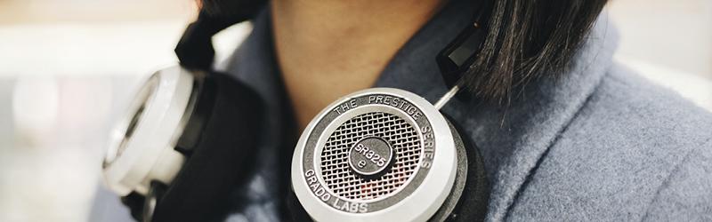 headphones around a persons neck